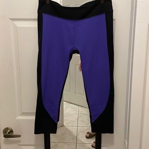 Fabletics VGC M Tron vivid purple crop compression pants color block
